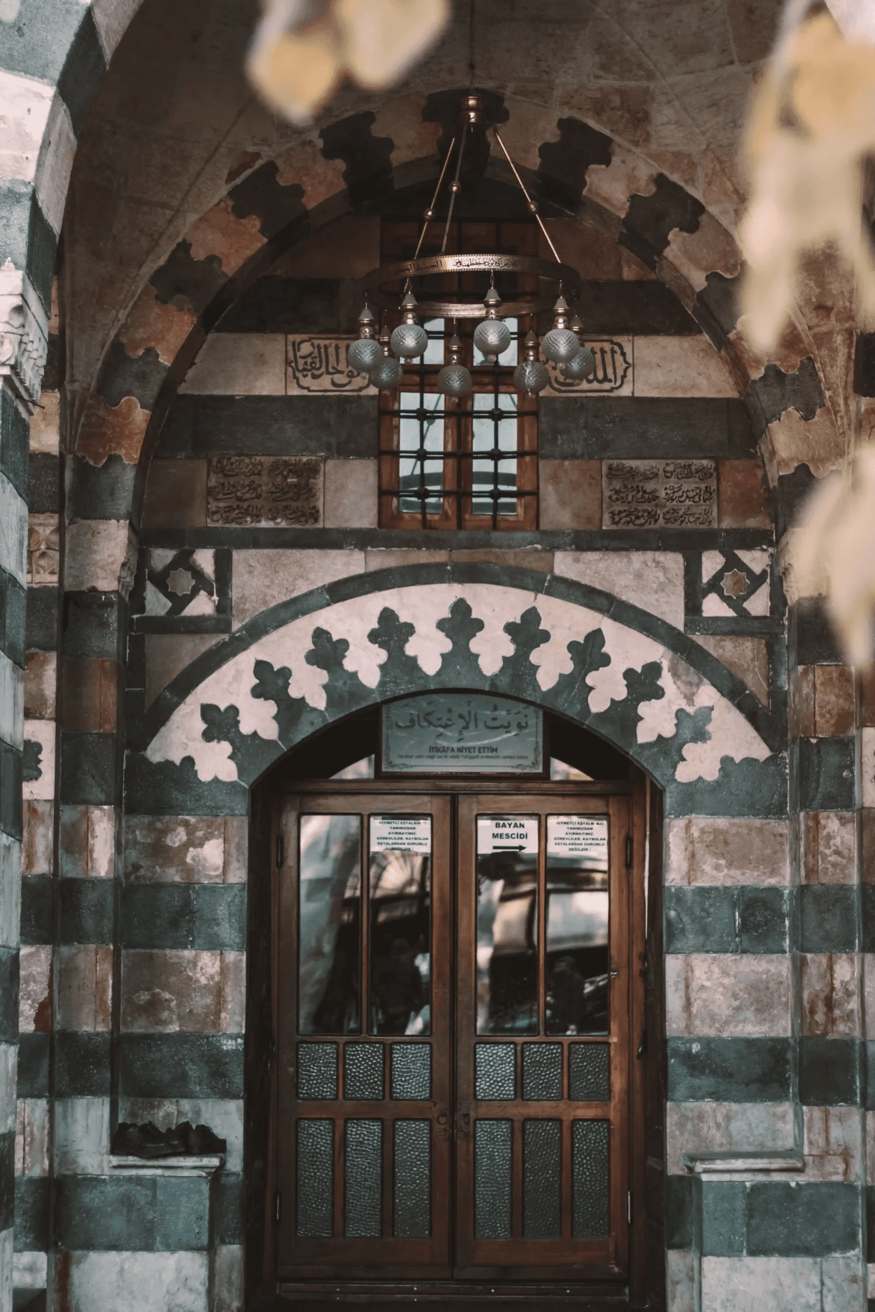 Ablaq doorway of alternating pale limestone and dark basalt courses in Old Damascus