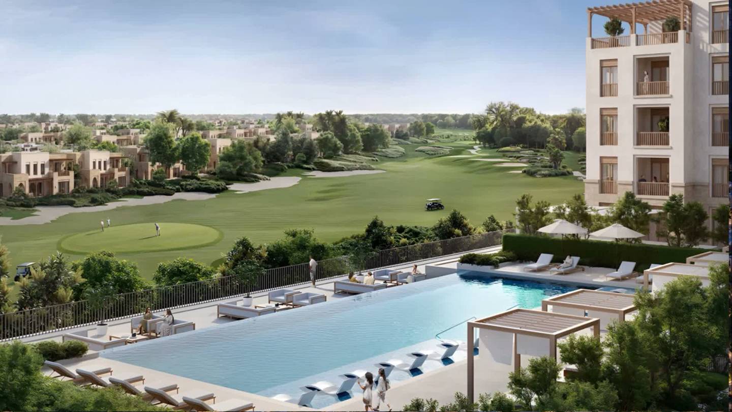 Aerial view of Damascus Heights: villas, apartments and a golf course at the foot of the mountains